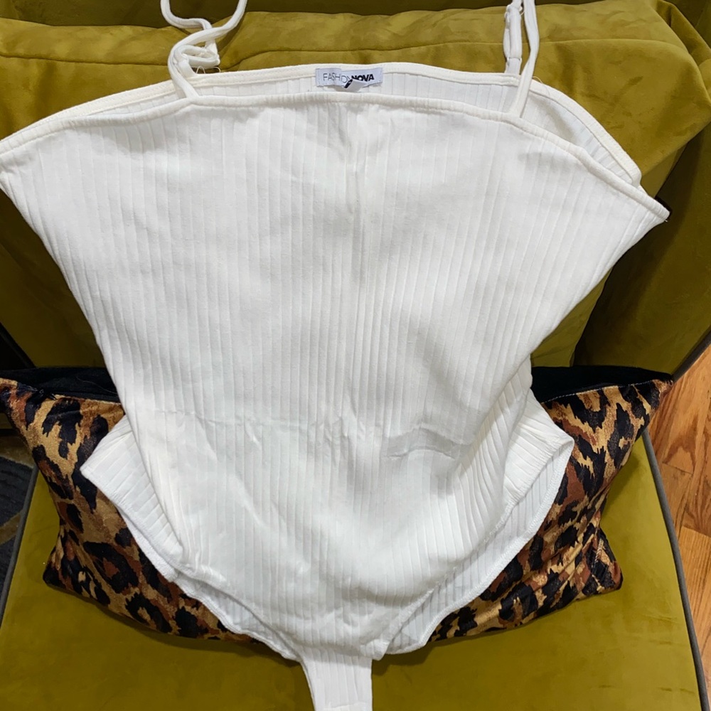 Fashion Nova Black and White bodysuits.